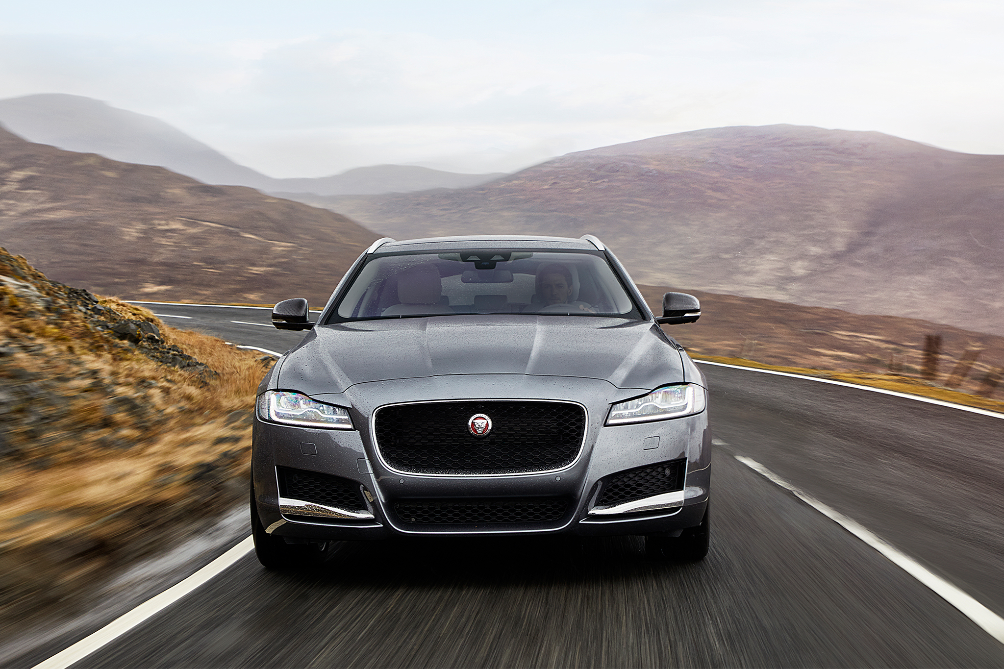 2018-Jaguar-XF-Sportbrake-front-view-in-motion.webp